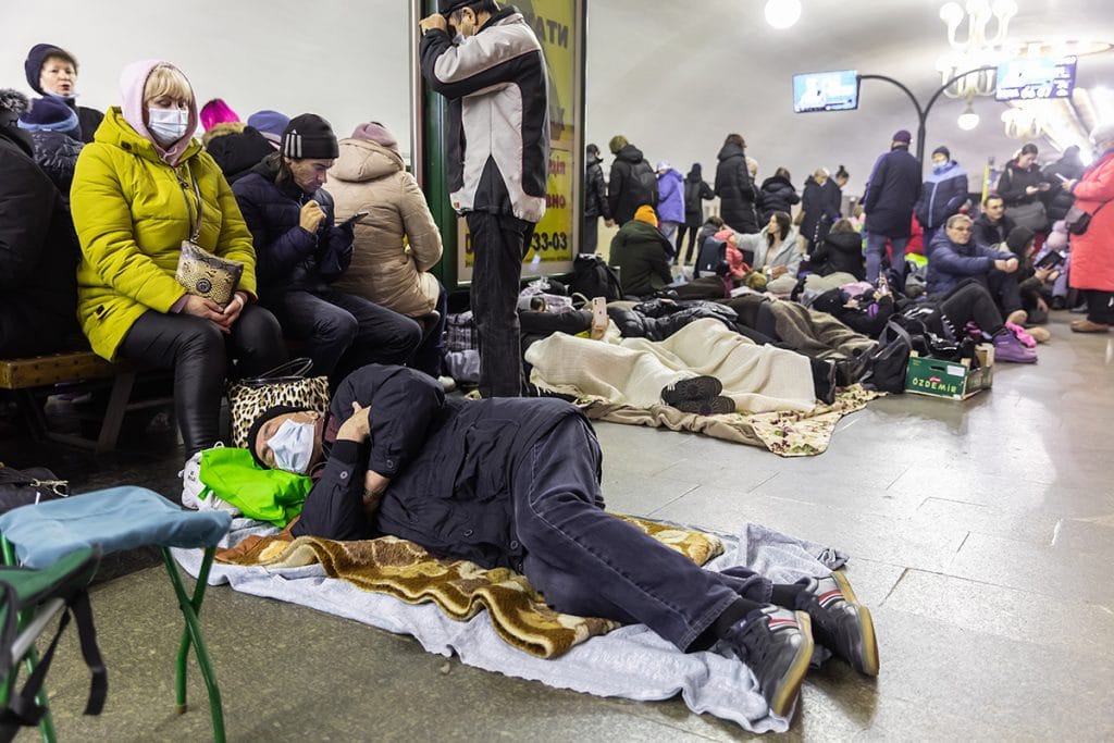 Families taking shelter in subway station in KYIV during a rocket and bomb attack.