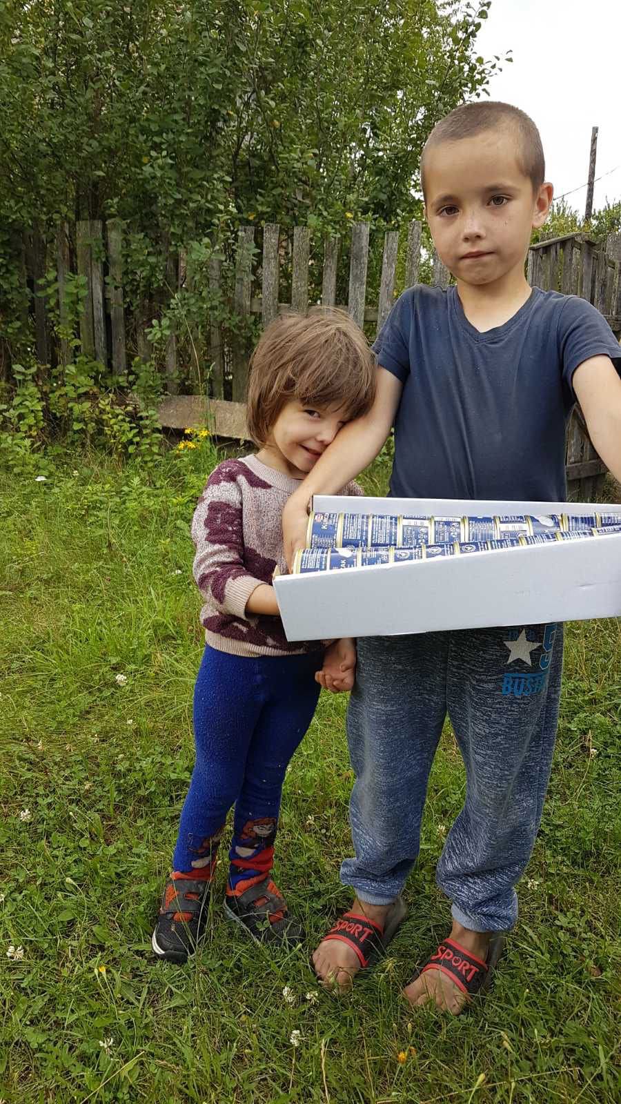 Ukrainian kids thankful for food donation.