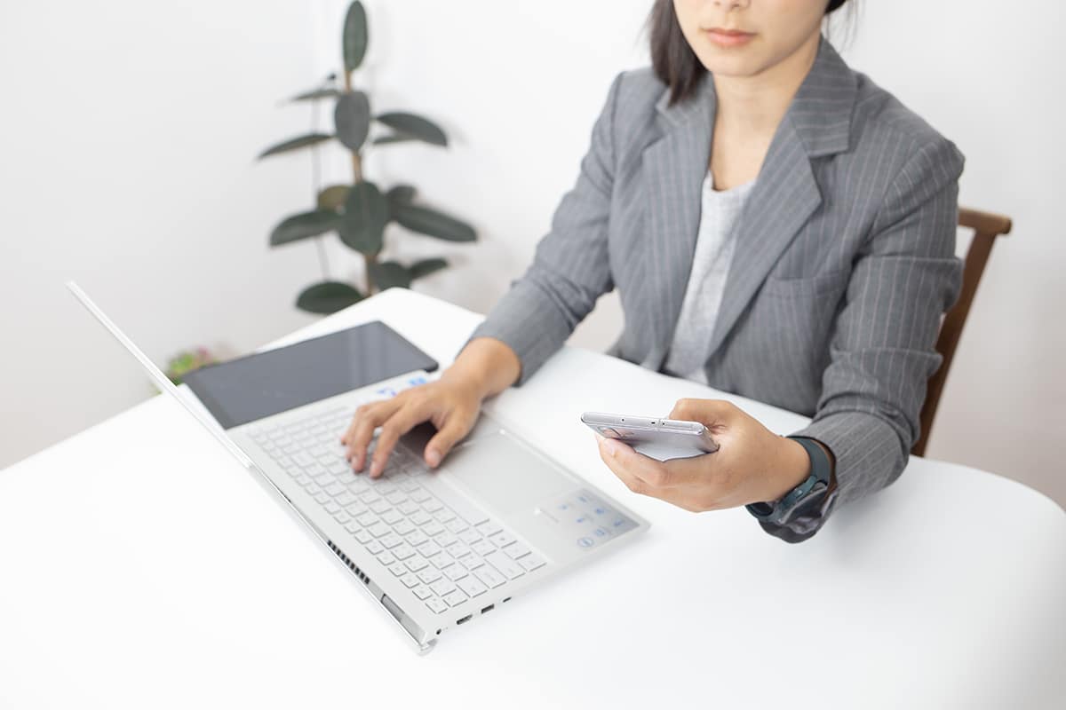 woman working at her desk woman working at her desk